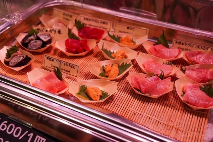 Tokyo: Private Tsukiji Street Food & Sake with Local Guide - Reading Tsukiji Outer Market through food