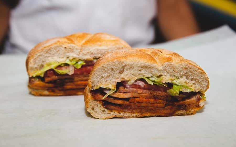 Toronto: St Lawrence Market Food Tour with 6 Tastings - Walking toward the Distillery District