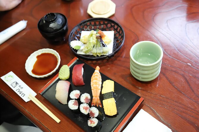 Tsukiji Fish Market Guided Tour and Sushi Making with Pro Chef - The smaller wholesale area and market etiquette