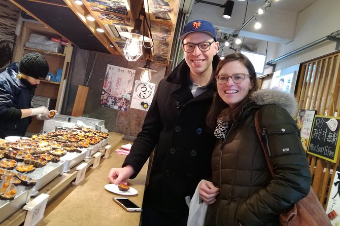 Tsukiji Food and Toyosu Market with Government-Licensed Guide - Tsukiji Hongwanji Temple adds architecture and calm