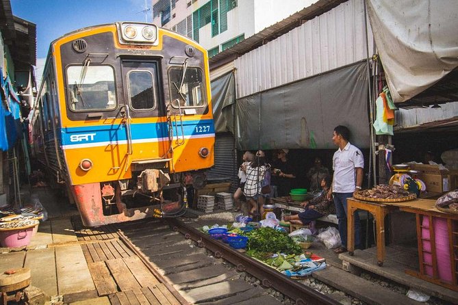 Unique Bangkok Markets: Train Market & Floating Market Adventure - The guide’s role in making the markets easier
