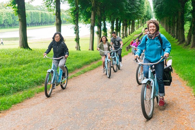 Versailles Palace Bike Tour with Market & Marie-Antoinette hamlet - Shopping at the Notre-Dame Market
