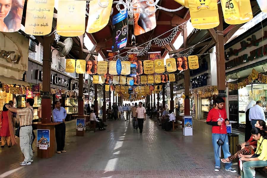 walking tour in old dubai, souks, abra boat, old town - Crossing Dubai Creek by abra