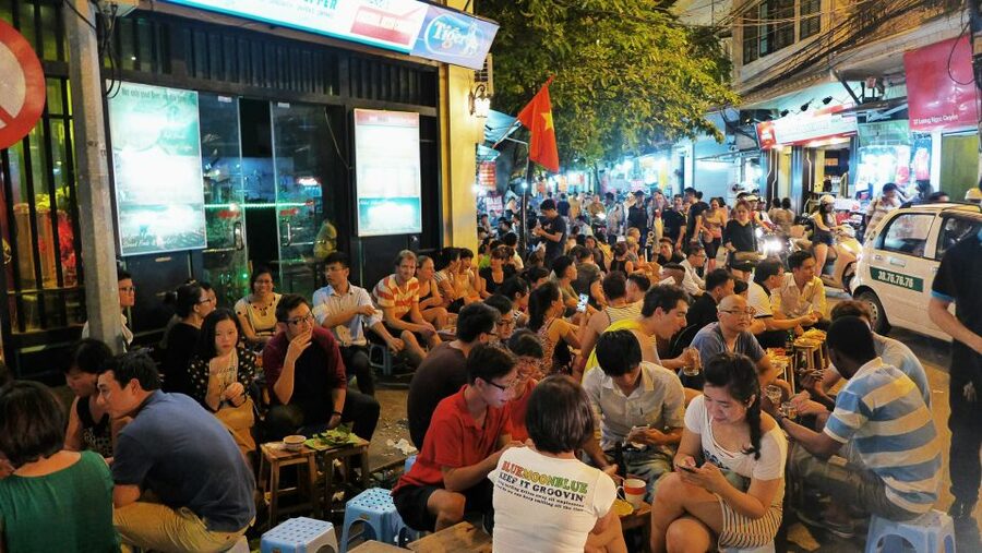 Weekend Hanoi Night Market & Street Food Tour - Banh mi, sticky rice with ice cream, and egg coffee